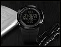 L black outdoor sports digital watch front view with large clear display
