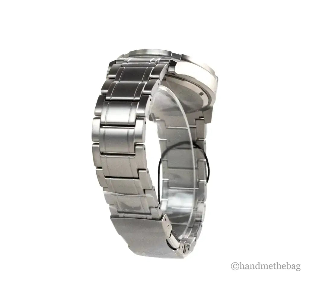 Citizen Weekender Sport Eco-Drive watch features a green dial and stainless steel band, showcasing a sporty design.