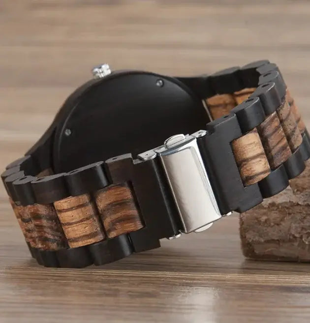 Wooden couple watches set featuring black and natural wood grain link bands with silver clasp
